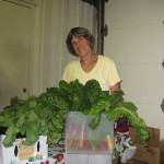 Anne Dean brings produce from her garden